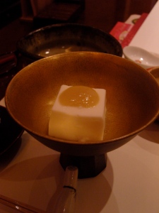 One type of tofu with a yummily sour/sweet mixture of miso and grapefruit sauce